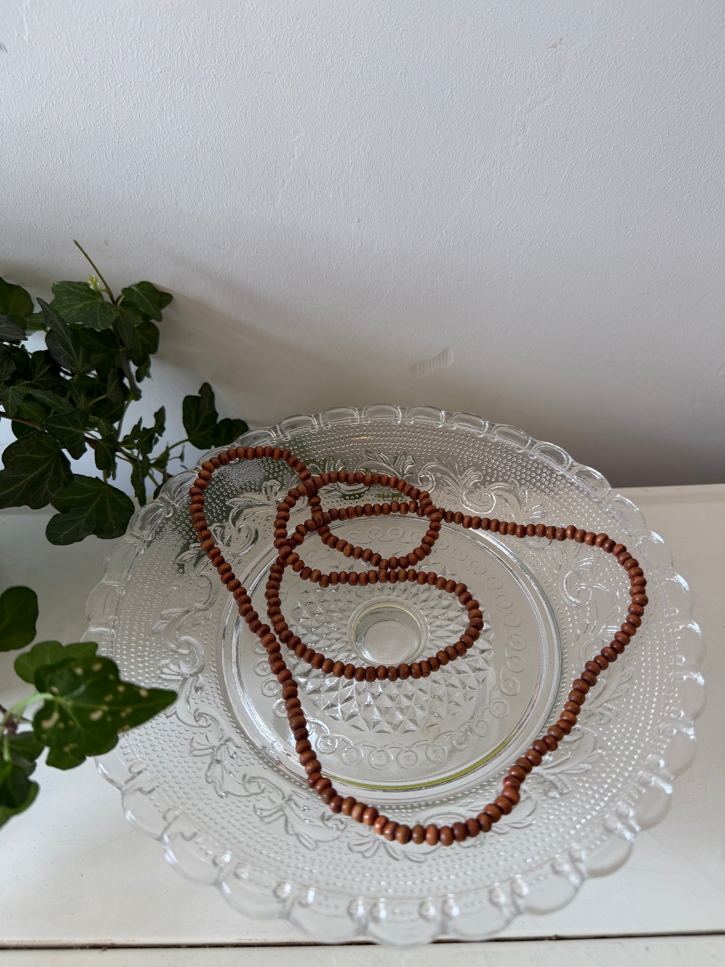Lange ketting bruine kraaltjes