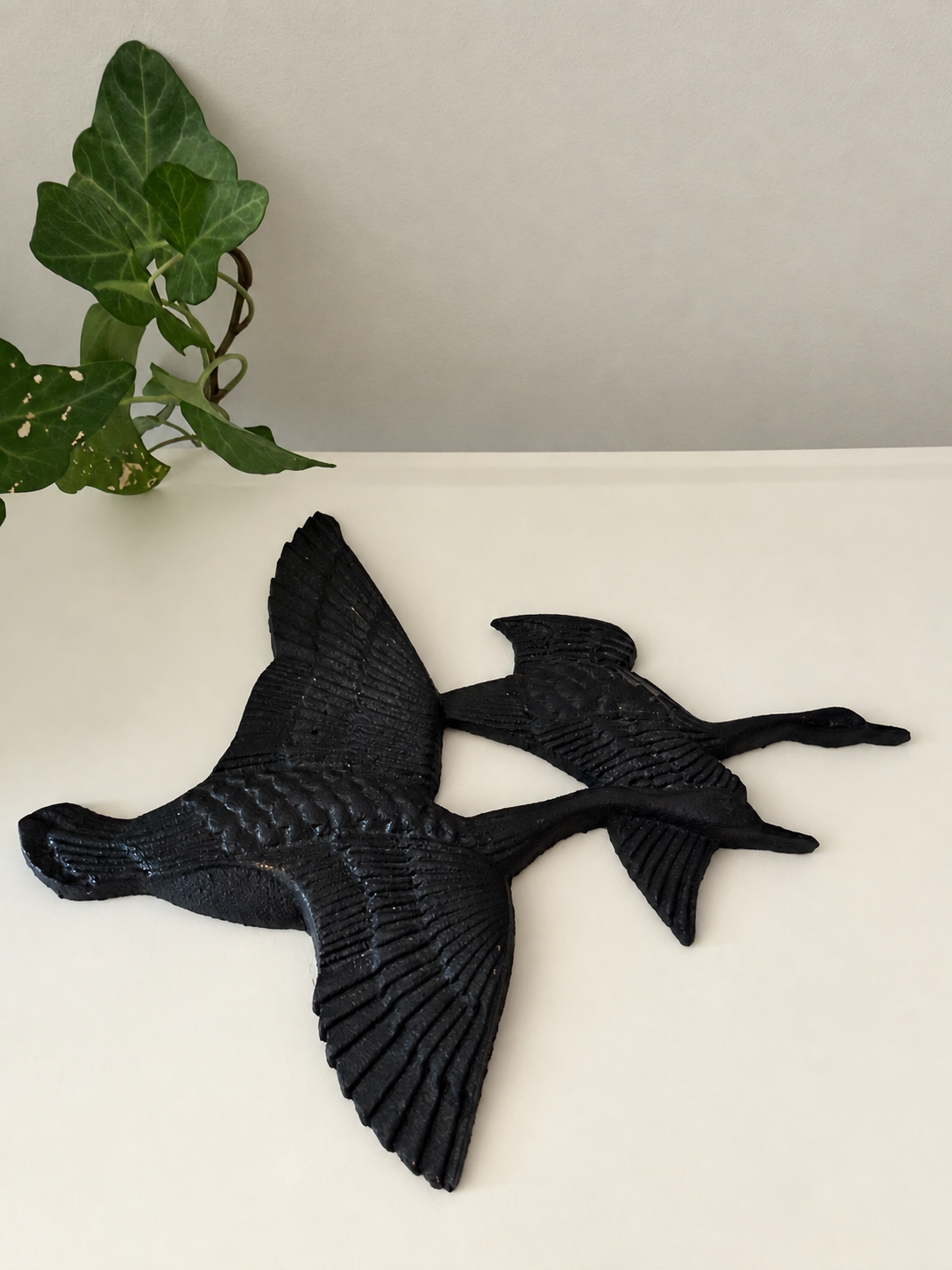 Gietijzeren wandvogels