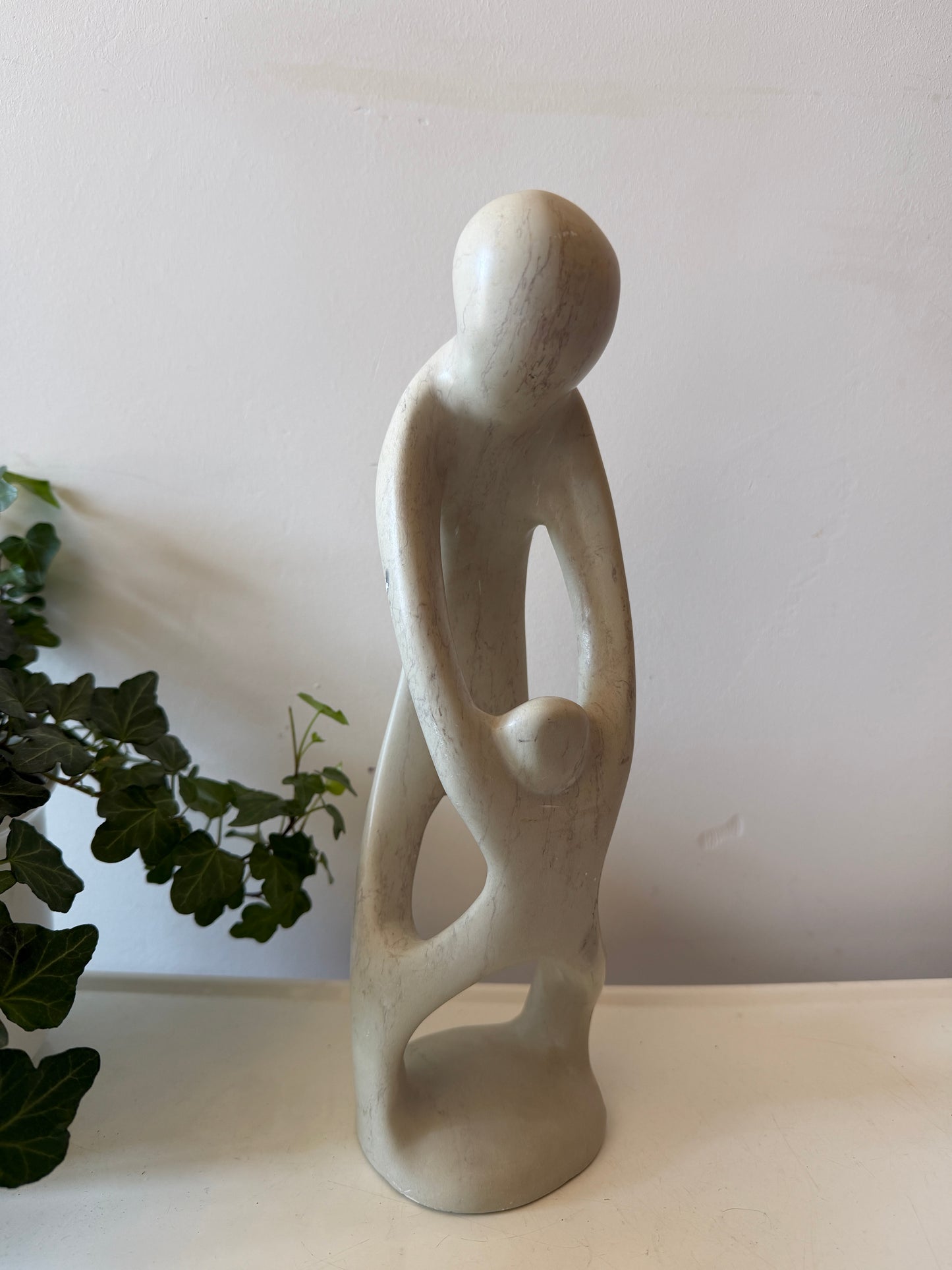 Spekstenen beeld ouder en kind