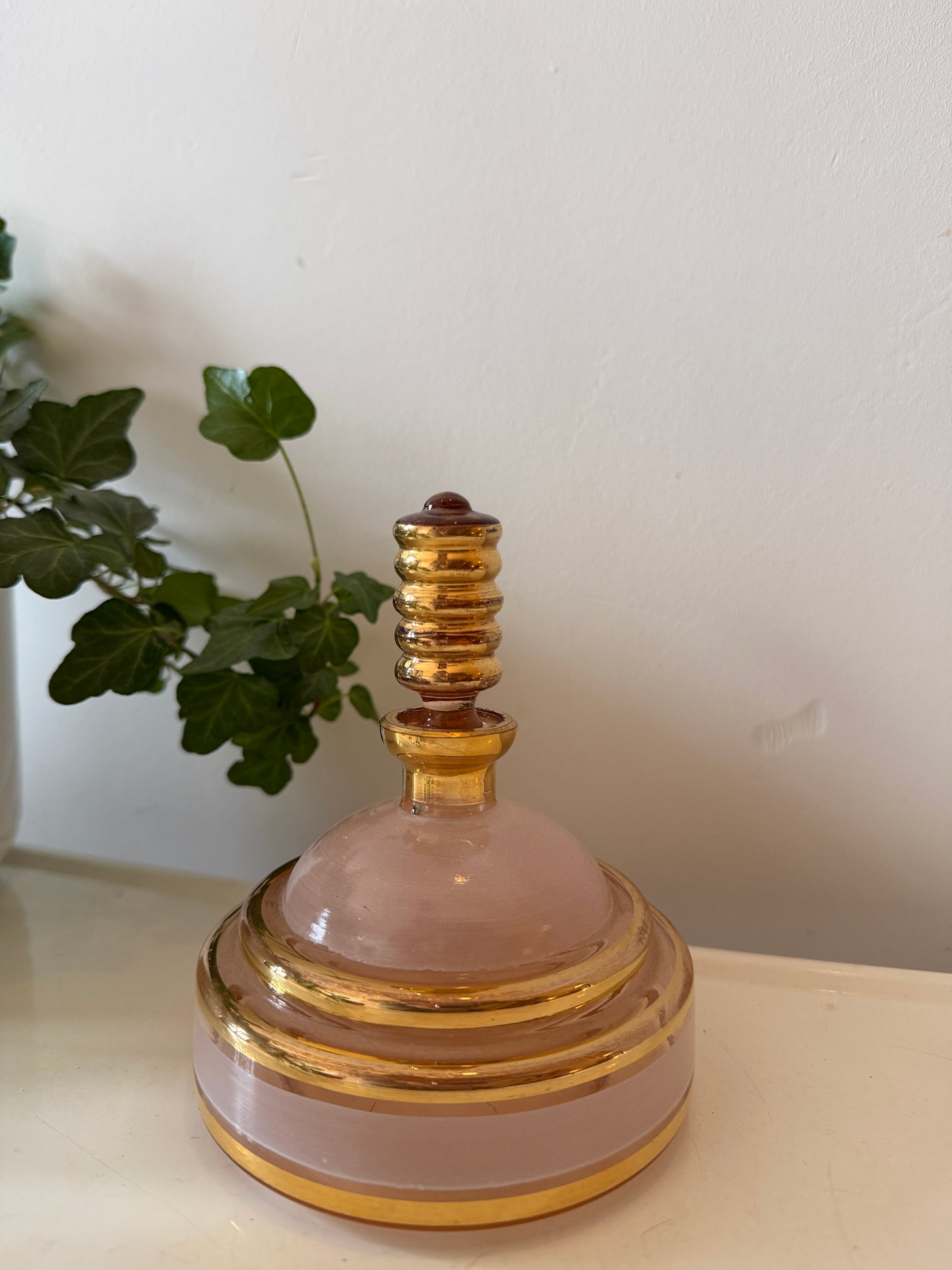 Parfumfles glas roze en goud kleurig