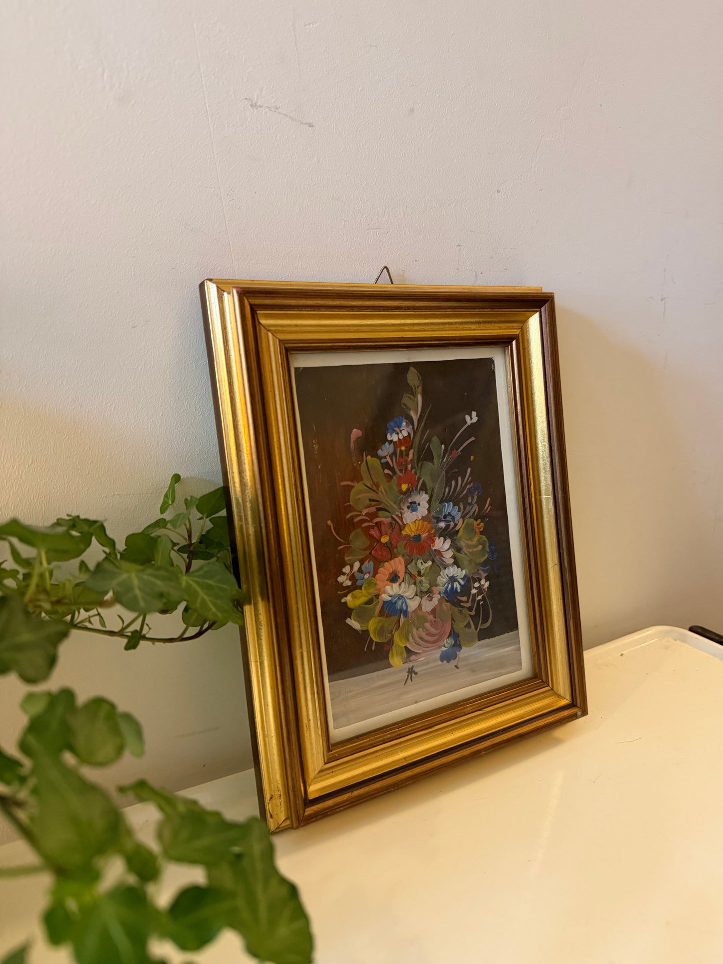 Goudkleurig lijstje met boeketje