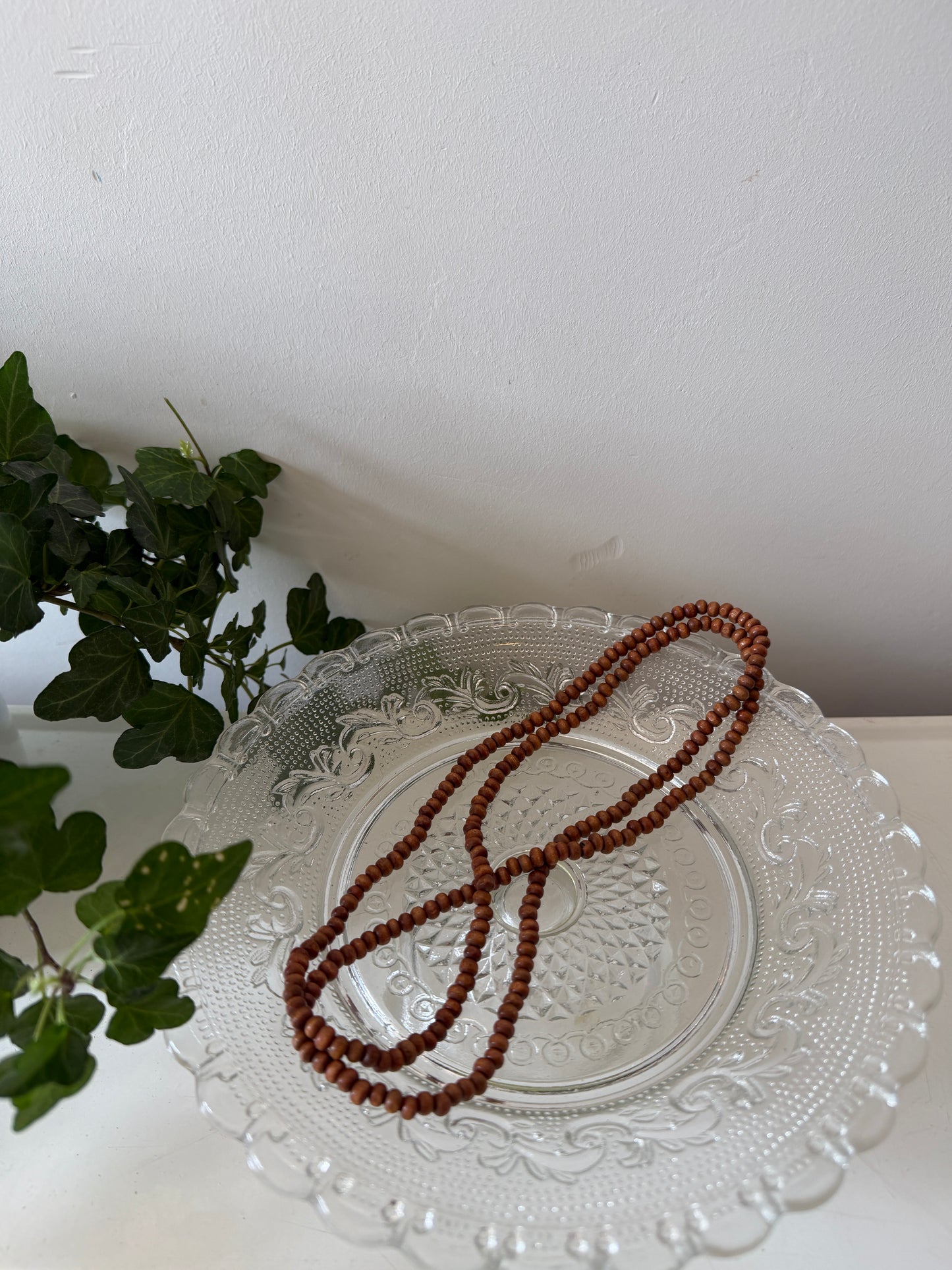 Lange ketting bruine kraaltjes