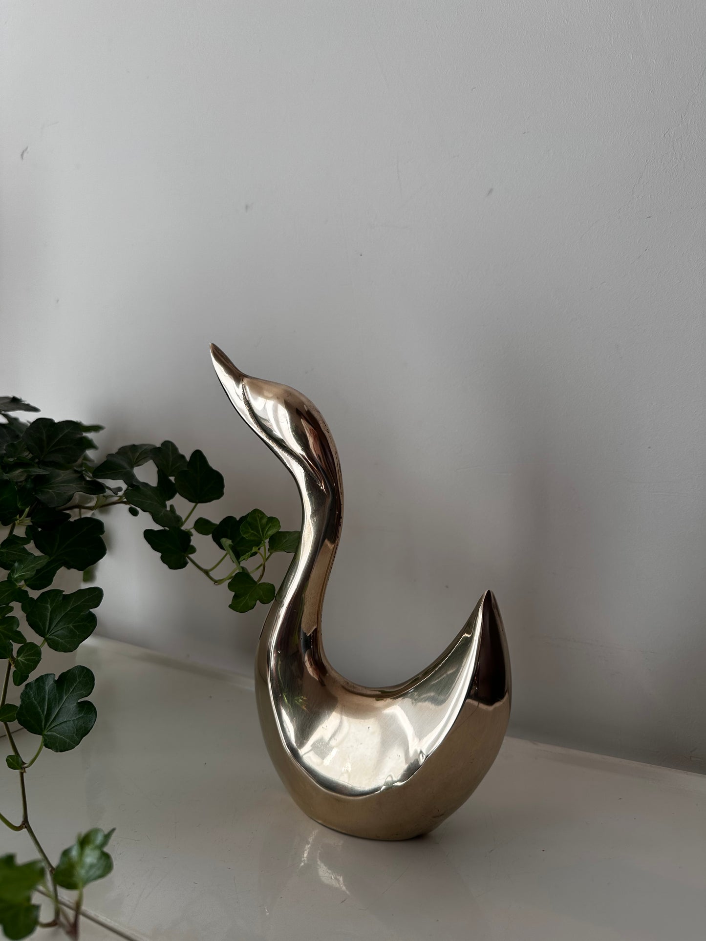 Vintage messing zwaan