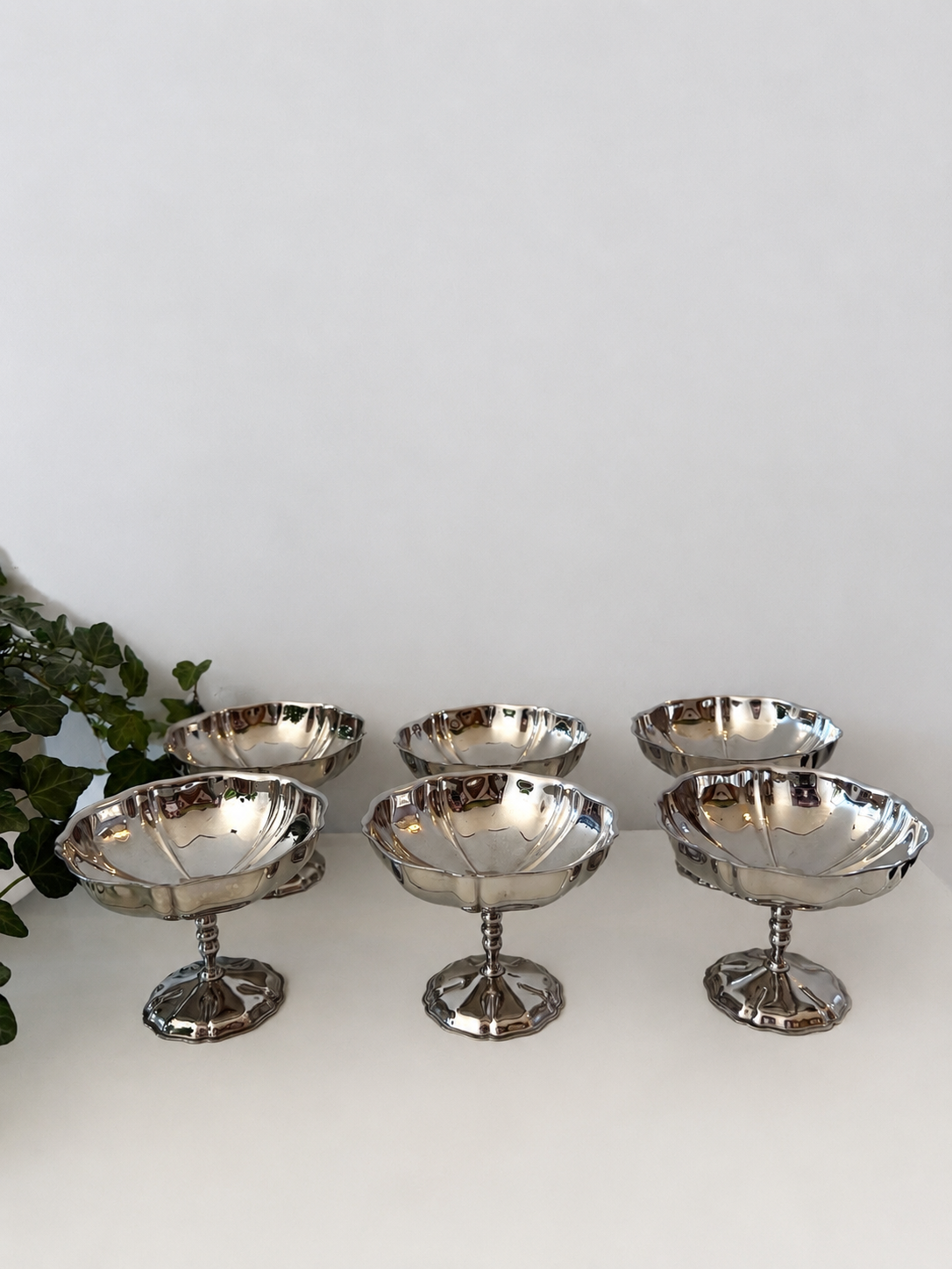 Set van 6 chrome golvende coupes