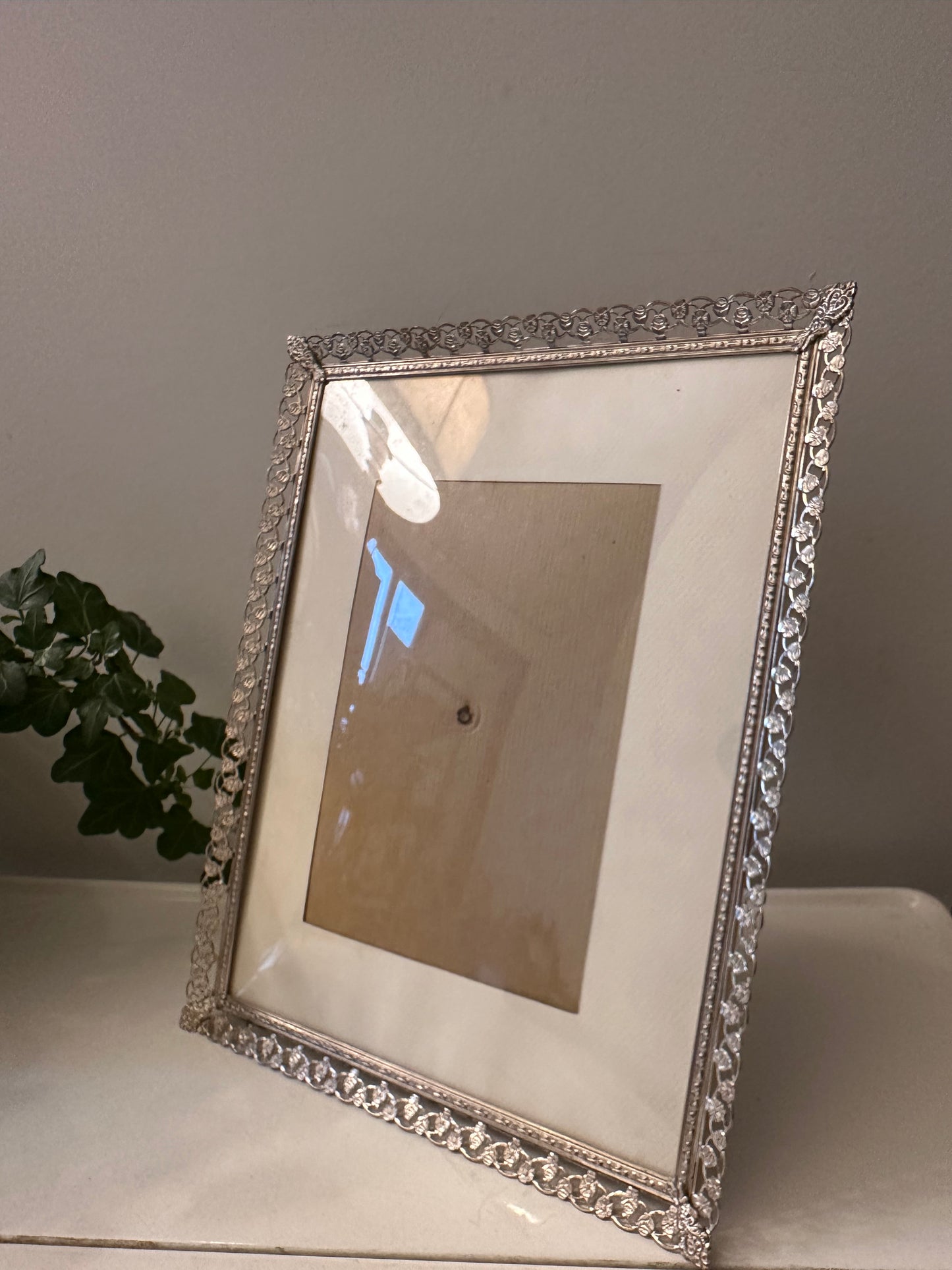 Jaren 60 fotolijstje met opengewerkte rand