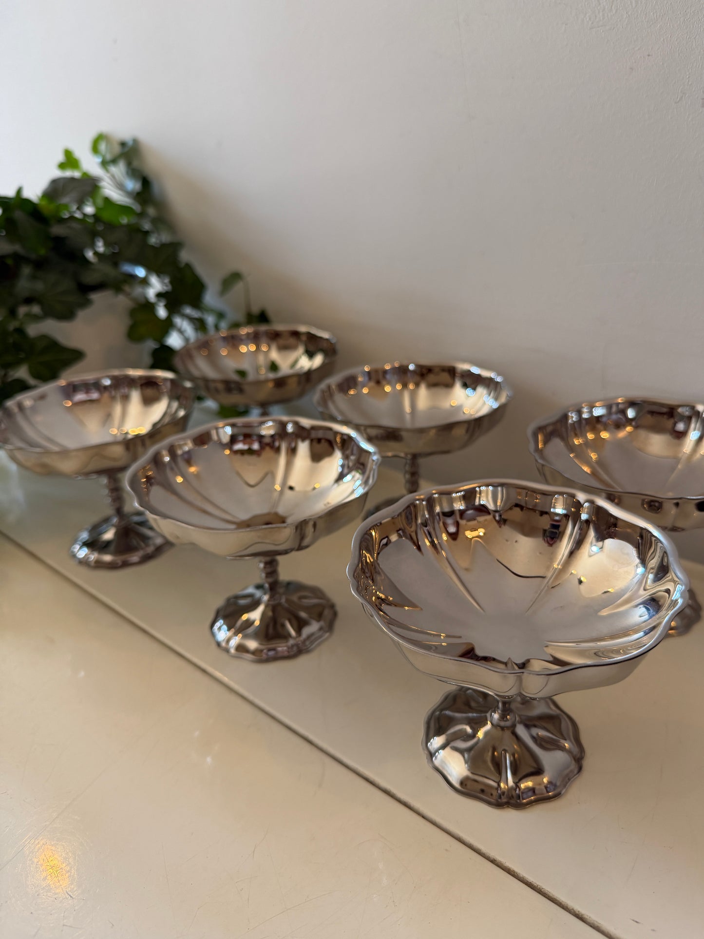 Set van 6 chrome golvende coupes