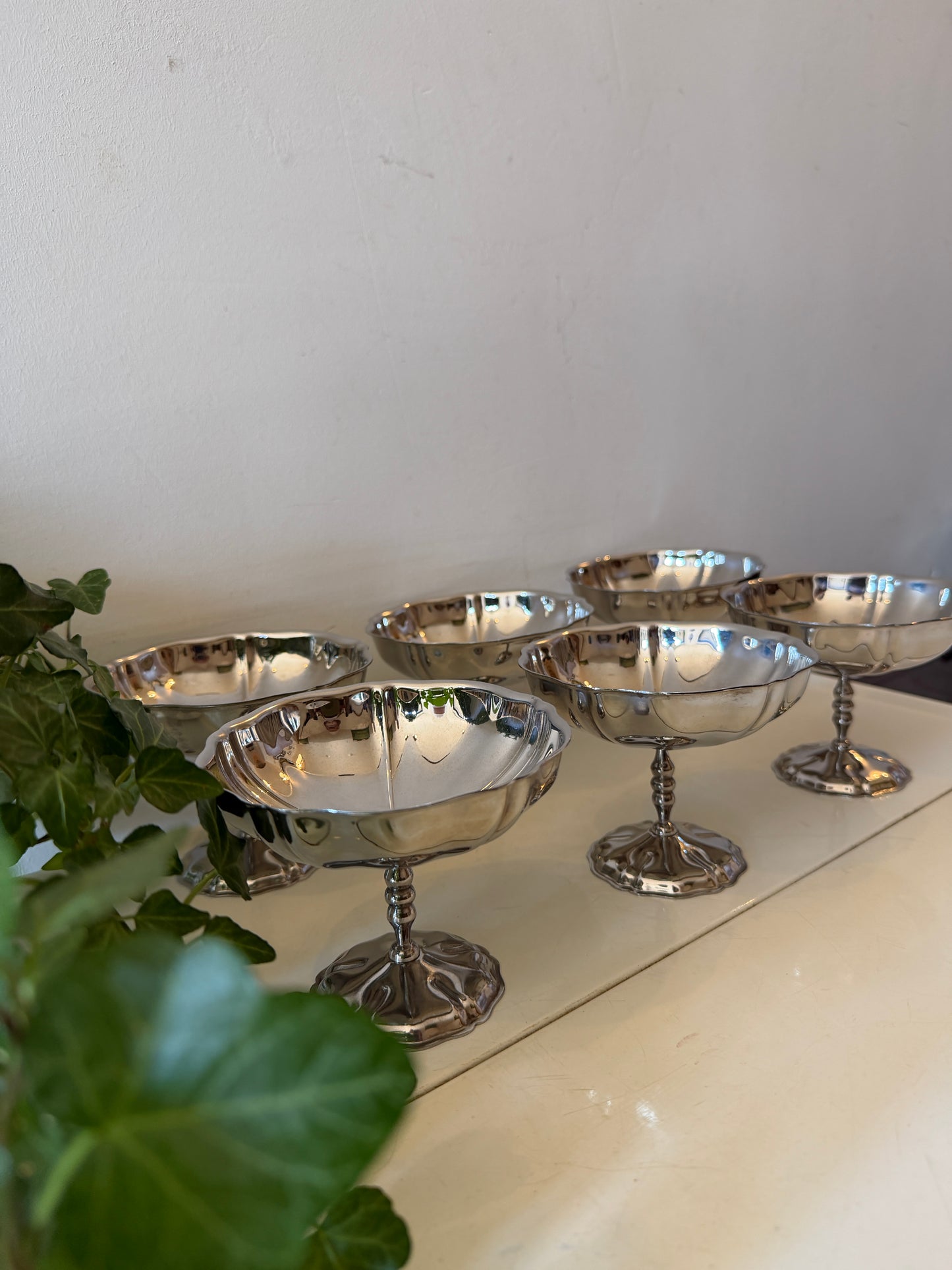 Set van 6 chrome golvende coupes