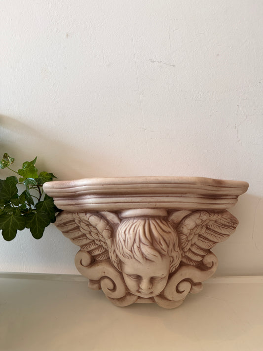 Wandconsole met engelenhoofdje