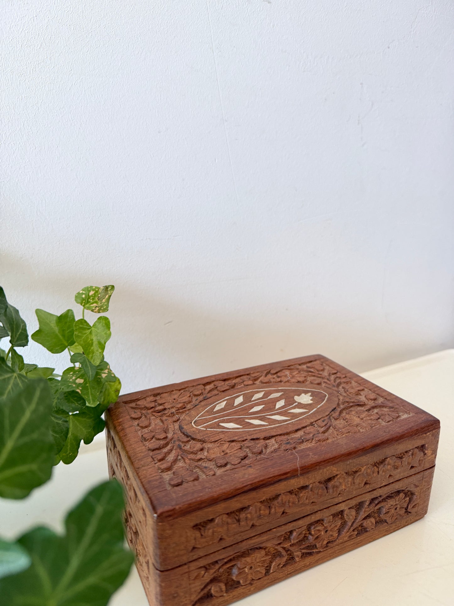 Houten bewaardoosje met beeninleg