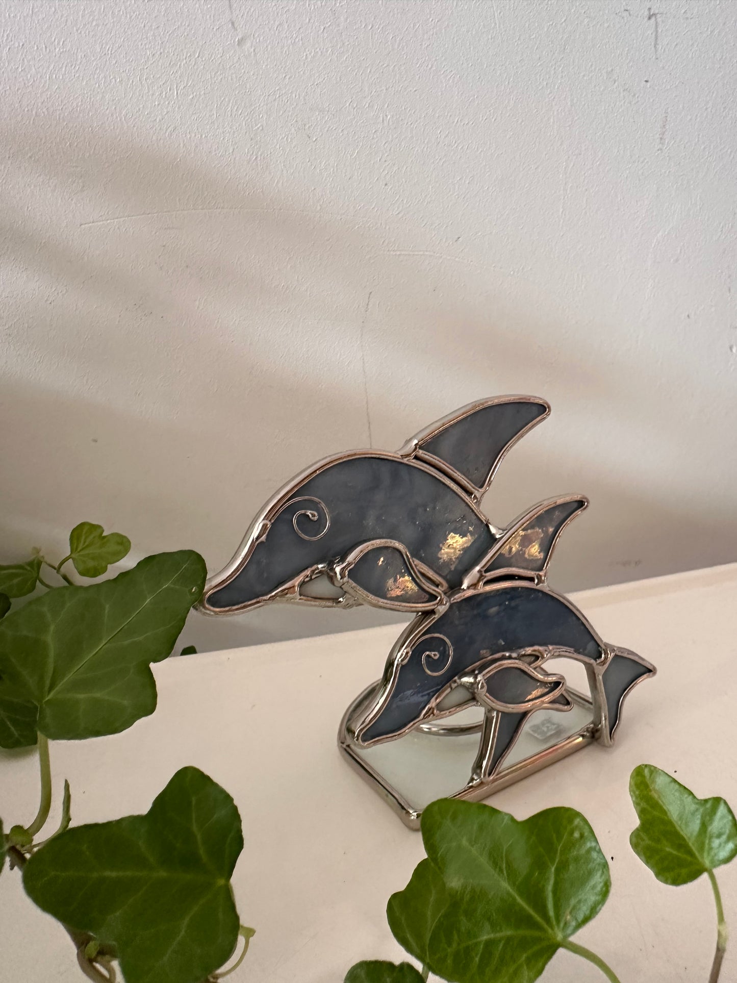 Waxinelichthouder vorm van een dolfijn