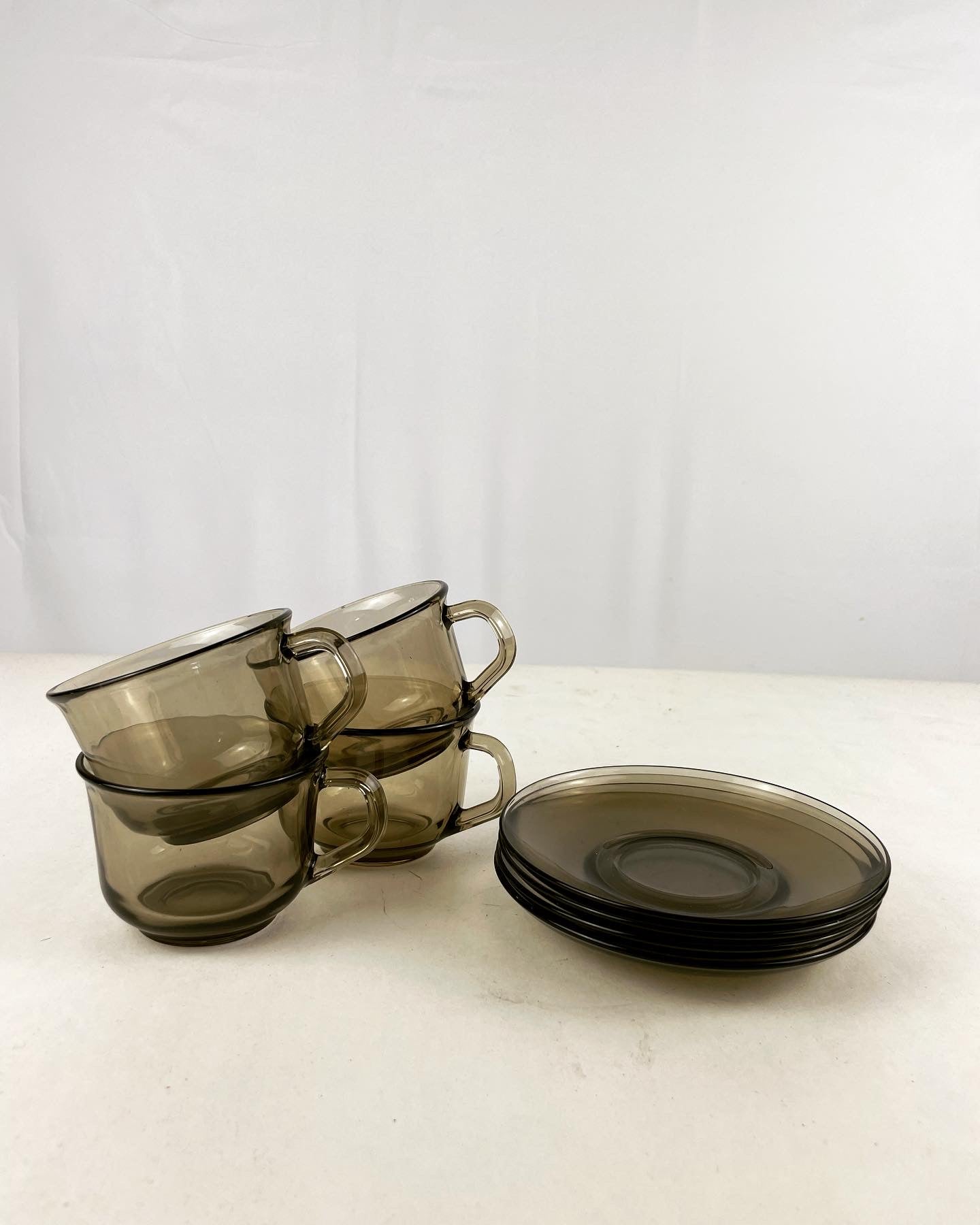 Vintage rookglazen kop en schotels